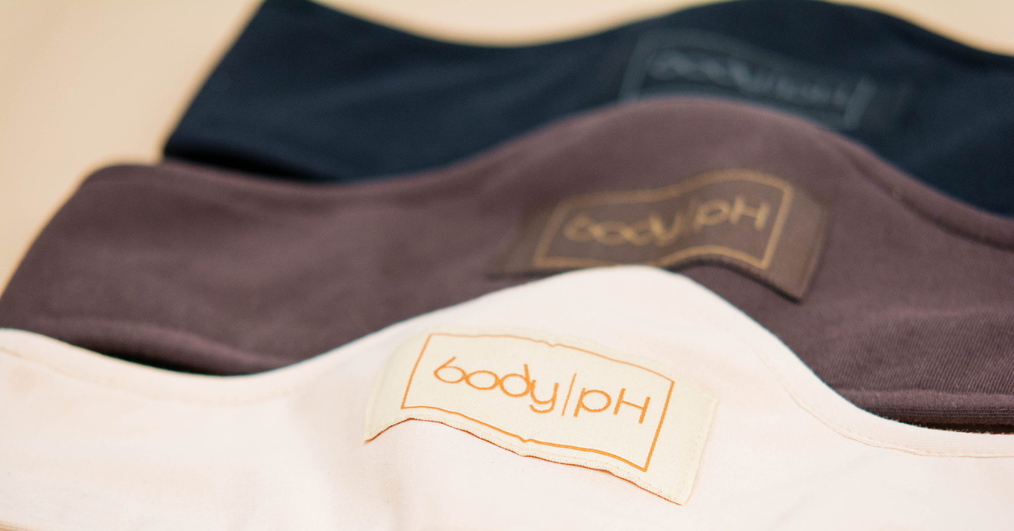 Three body pH bra liners close up, in three colours beige, brown and black.