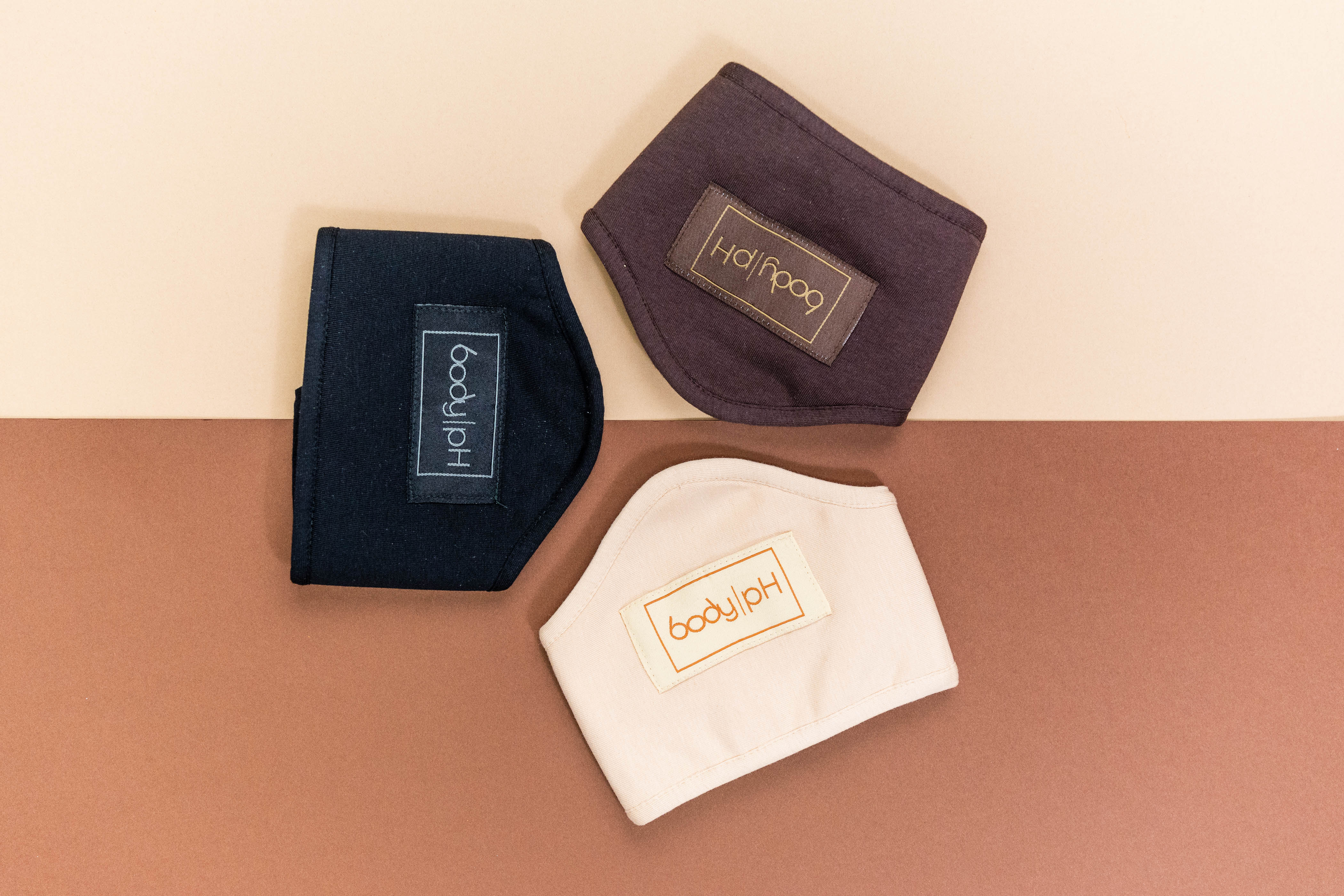 Three colours of bra liners product image with body pH logo on top.